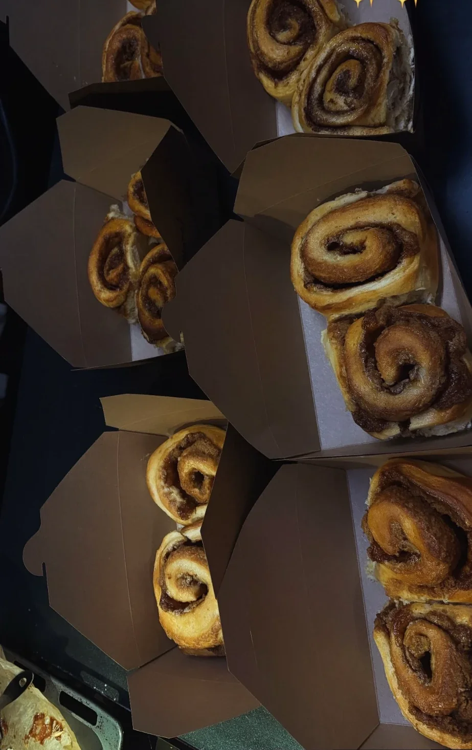 Cinnamon rolls packed in kraft boxes